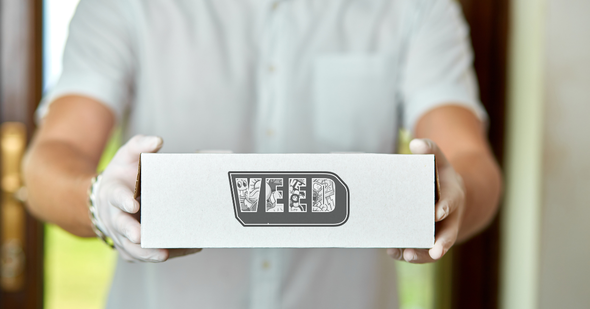 VEED logo displayed on a white box held by a person in front of a light background in VEED blog about how to buy safe THC gummies online.