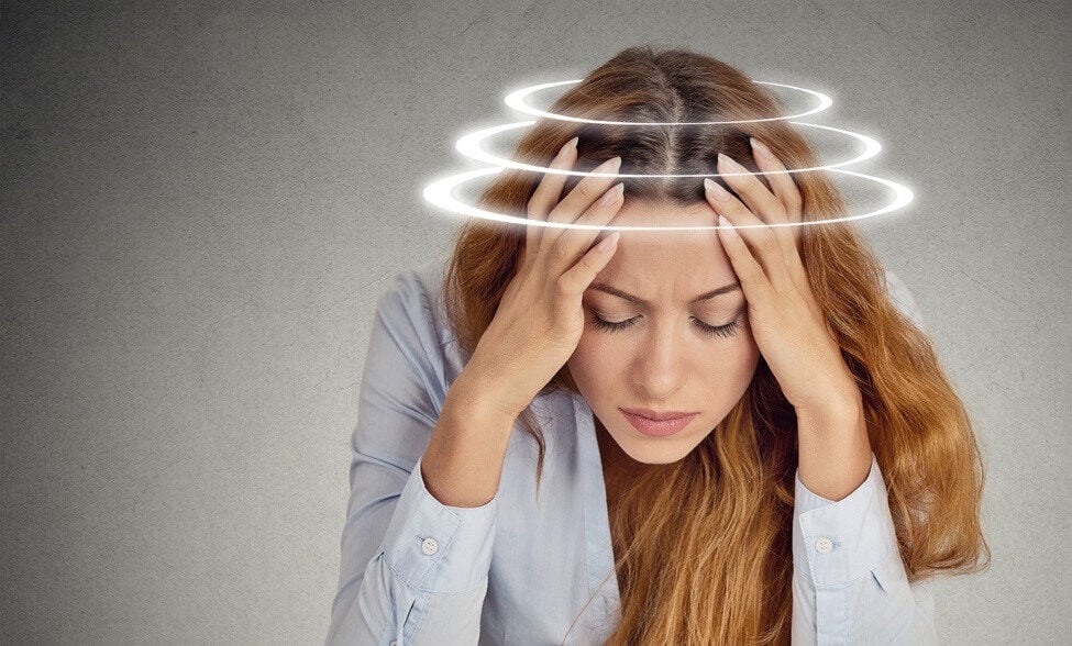 woman dizzy - representing using THC gummies to help with nausea
