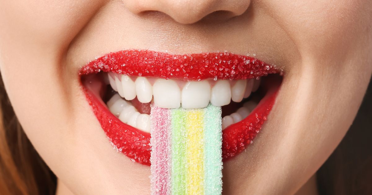 Image showing a women eating a gummy representing THC Microsdosing in the VEED Labs  blog